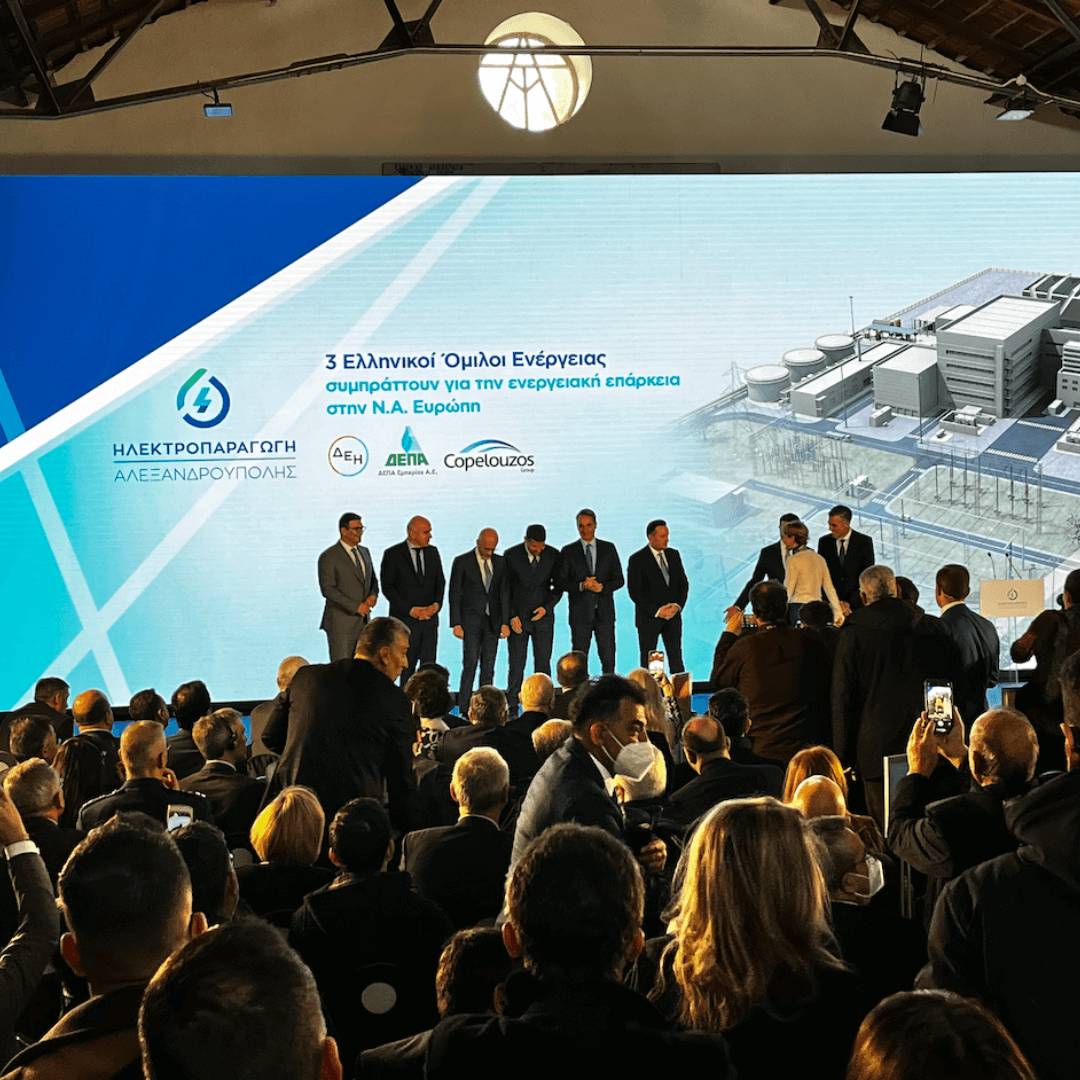 Audience attending a presentation on a led wall